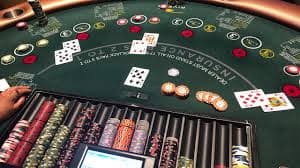 Antarmuka Infinite Blackjack di aplikasi seluler lapak88 menampilkan meja permainan dan dealer langsung